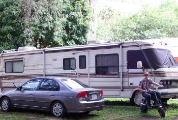 Andrew Wharton rides scooter to work from San Jose del Tajo RV motorhome park in Tlajomulco to Bugambilias Mall where he teaches English at Mundo Bilingue